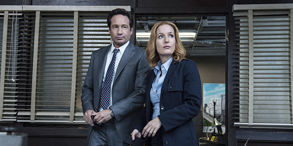 Fox Mulder and Dana Scully stand next to each other, The world explodes from the sexual tension. [Courtesy Ed Araquel/FOX.]