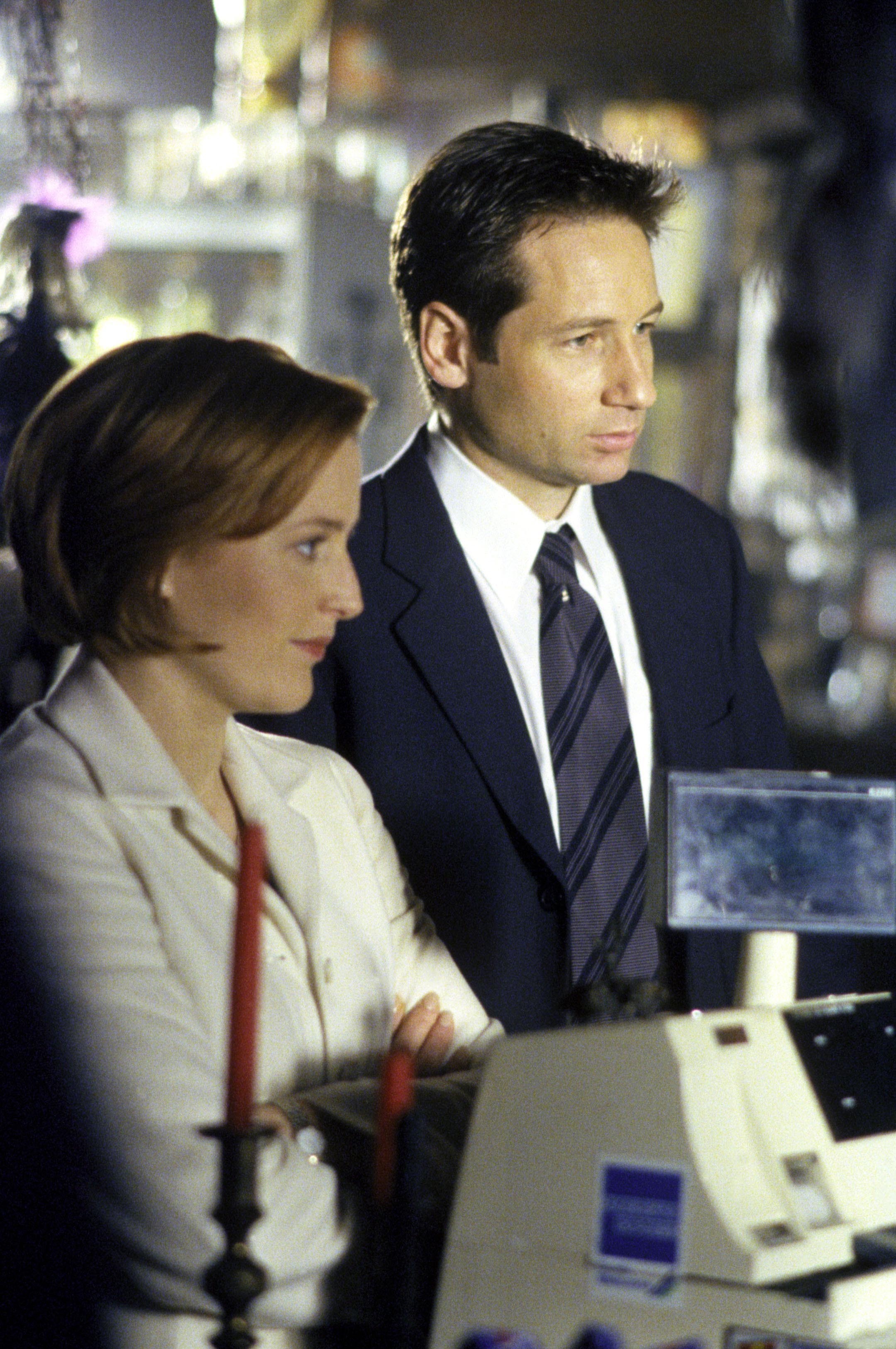 Mulder and Scully in the lab, doing science.