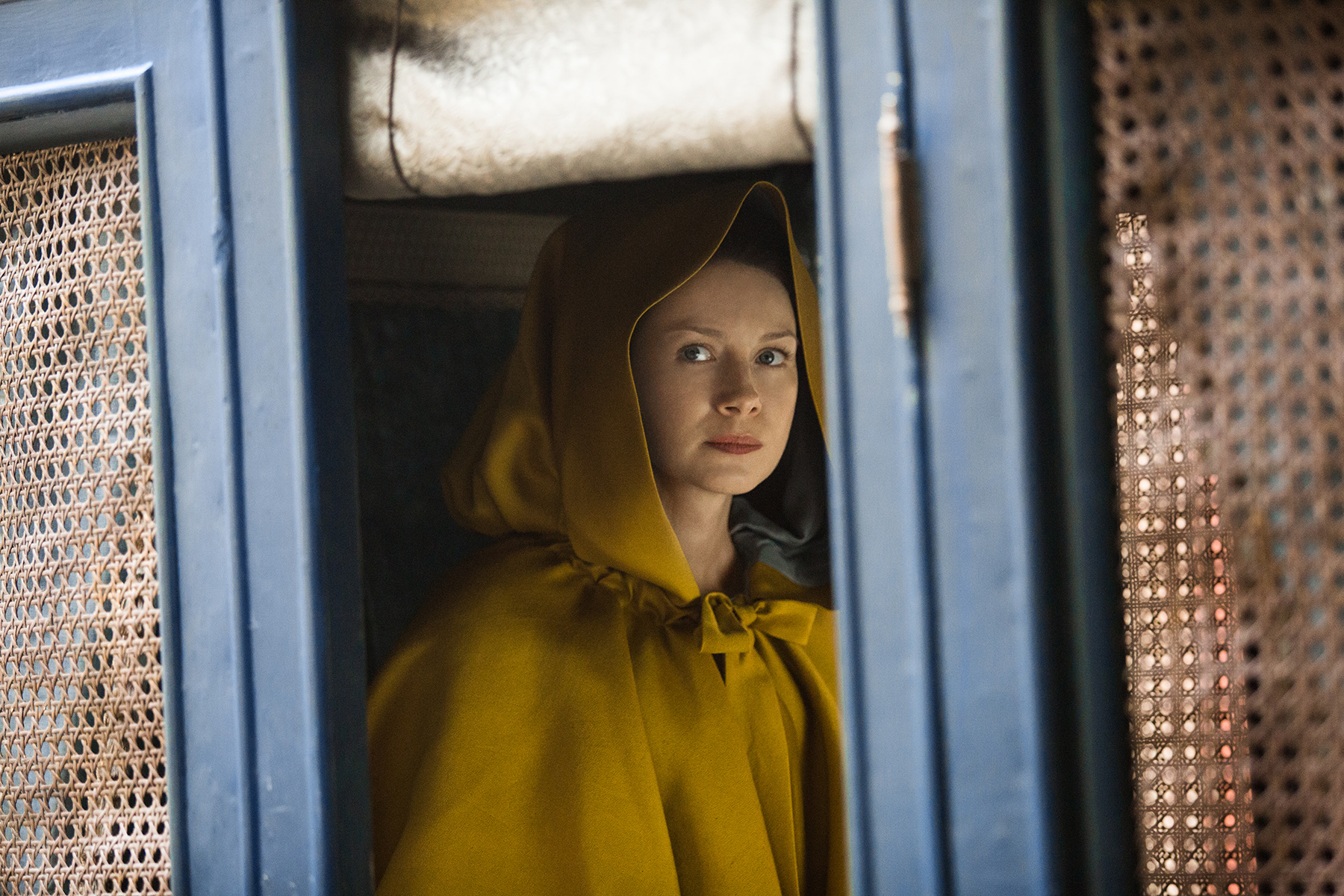 Claire in her yellow cloak, riding in the carriage. Why, Claire, why?