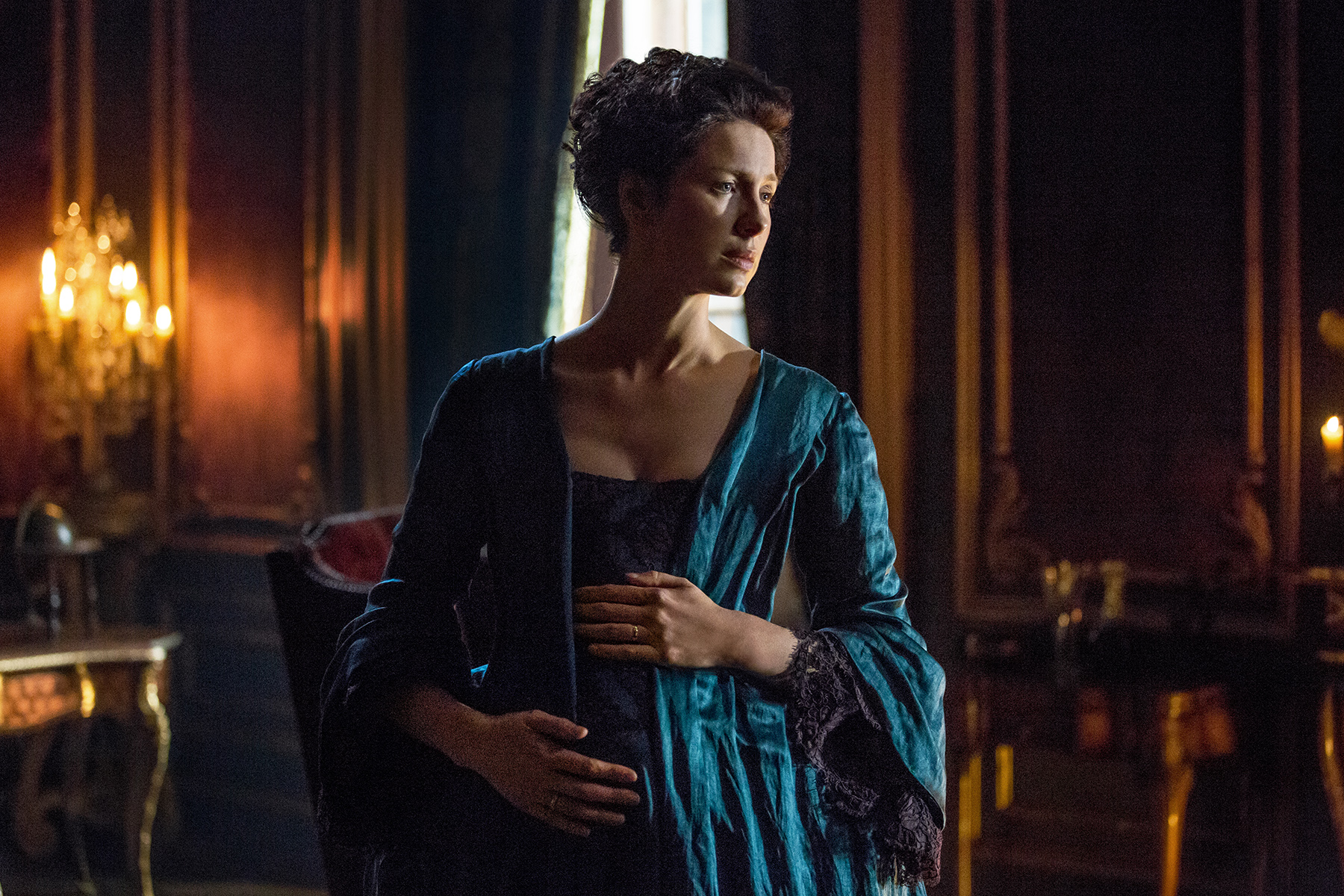Not even her beautiful silk gown can save her from my annoyance. (Caitriona Balfe as Claire Fraser.)