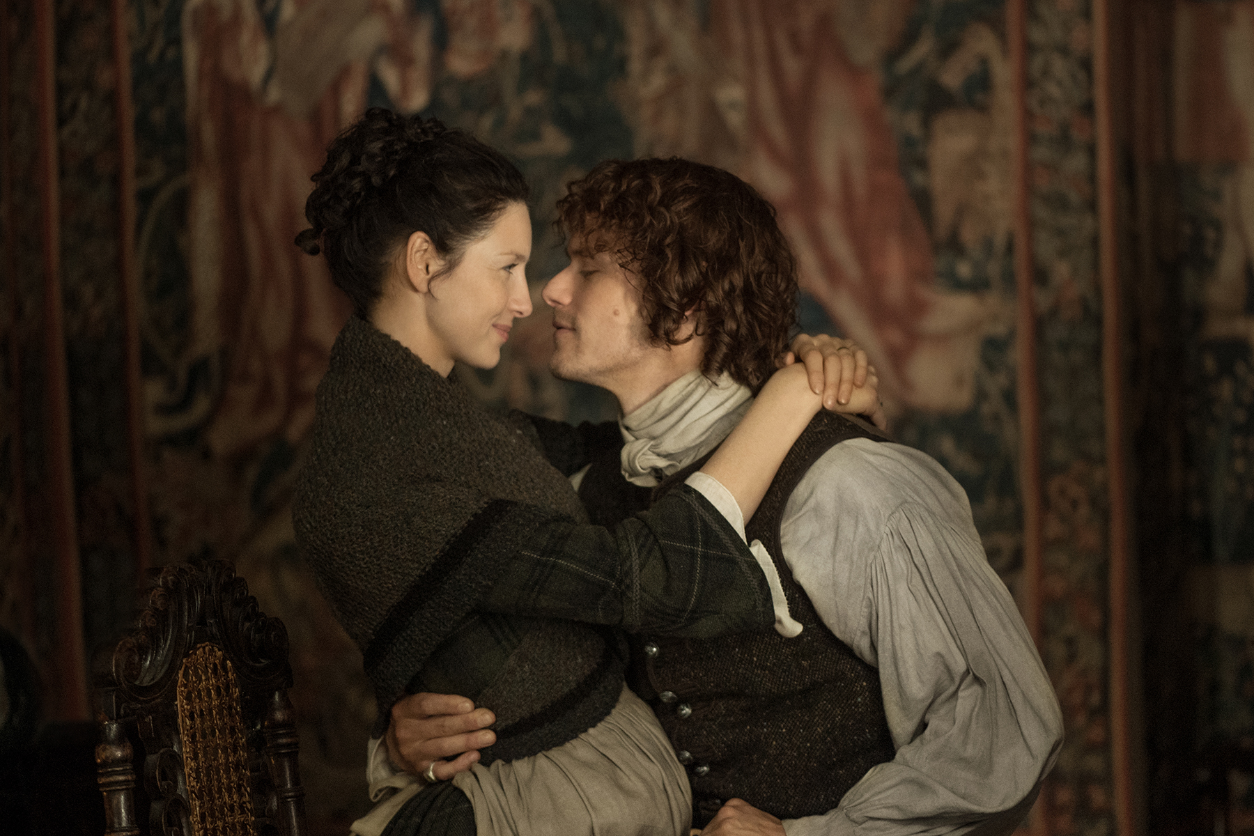This right here is what dreams are made of. (Caitriona Balfe as Claire Fraser and Sam Heughan as Jamie Fraser share a loving embrace.)