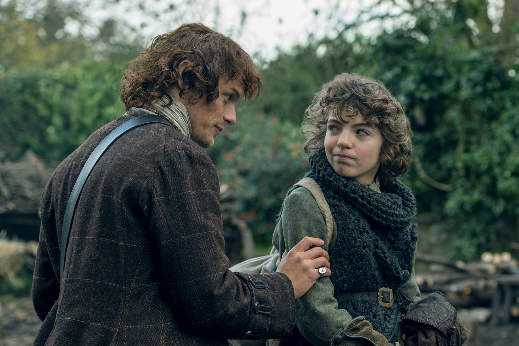 Jamie, no! Can't you see this child must be protected at all costs? (On right, Romann Berux as Fergus.)