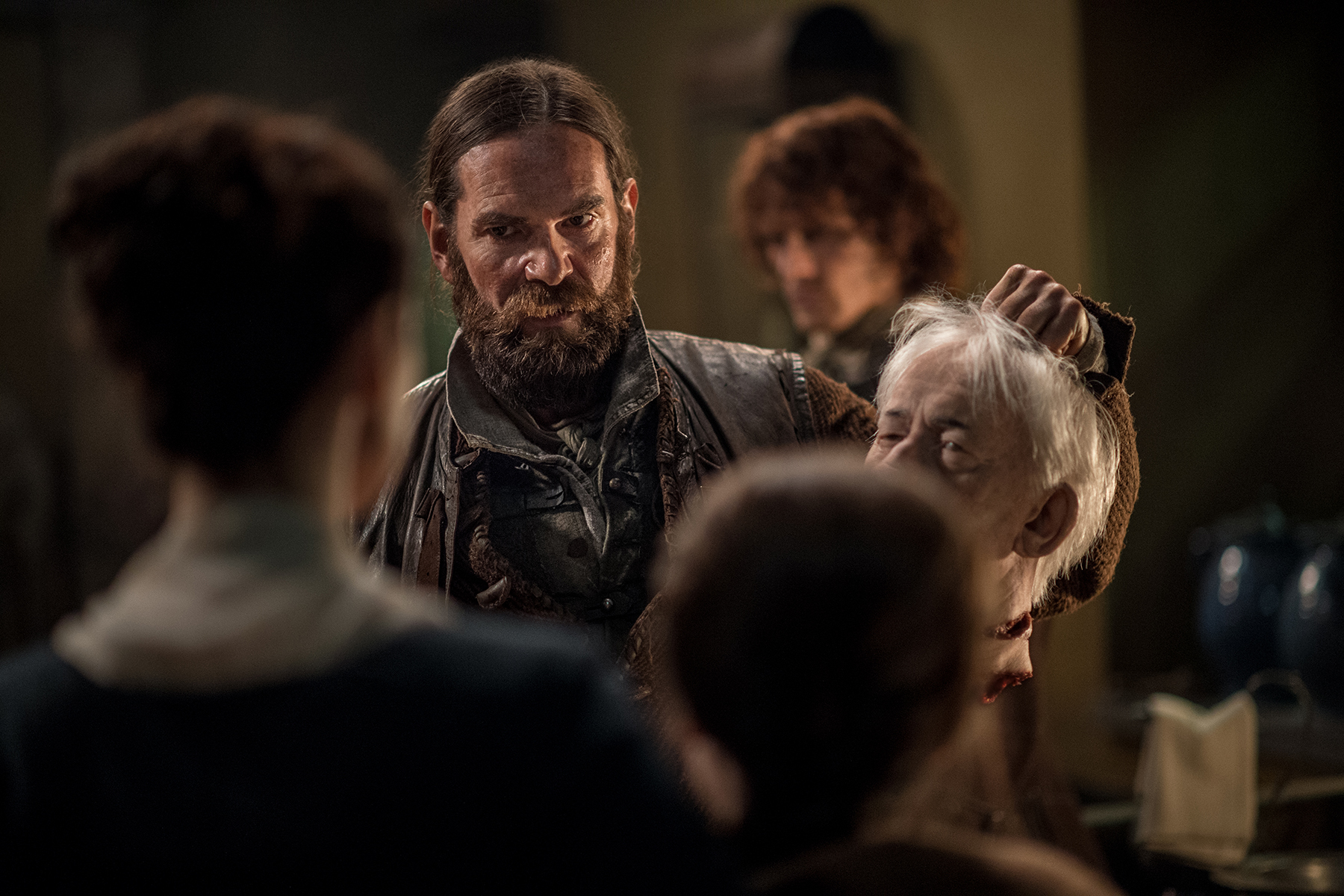 I mean, that is the man's head. Murtagh (Duncan Lacroix) is giving her the man's severed head. And it's awesome.